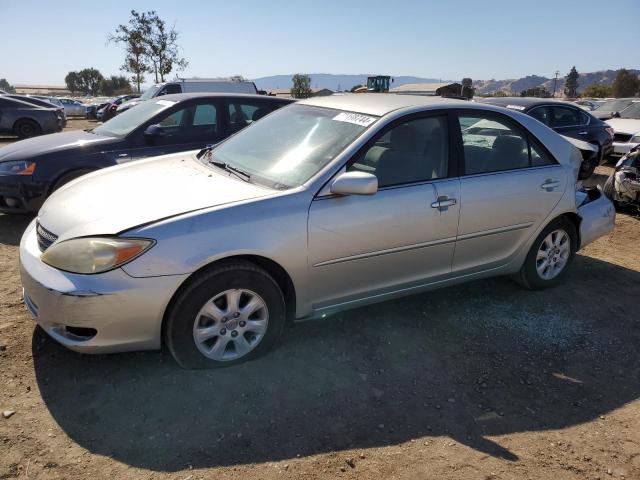 TOYOTA CAMRY LE 2003 with VIN JTDBF32K330138336 - Photo from auction