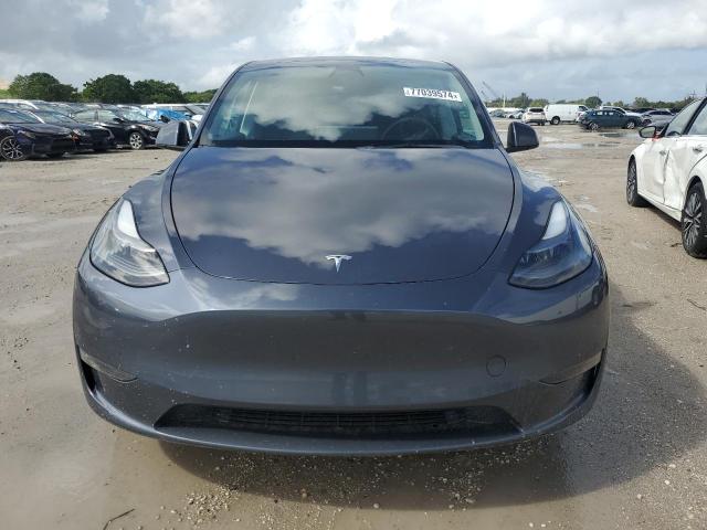 Photo 5 from auction – 2023 TESLA MODEL Y with VIN 7SAYGAEE6PF627048