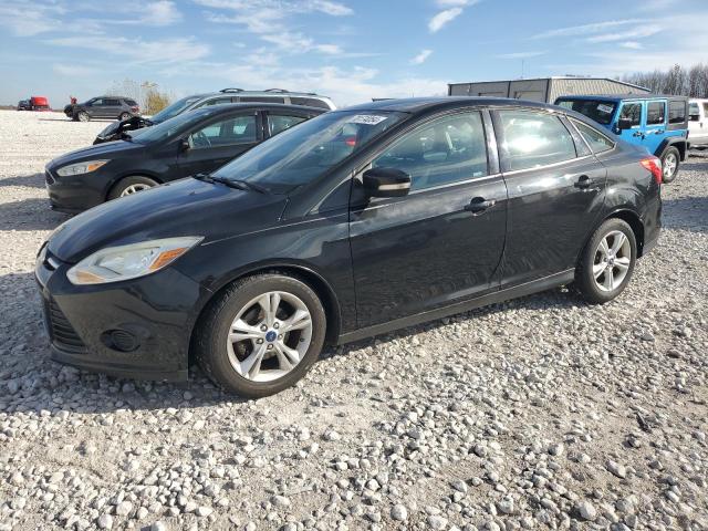 FORD FOCUS SE 2014 with VIN 1FADP3F28EL285825 - Photo from auction