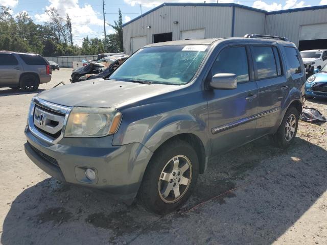 HONDA PILOT TOUR 2011 with VIN 5FNYF3H98BB036013 - Photo from auction
