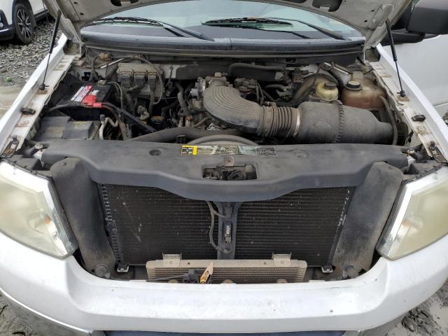 Photo 11 from auction – 2004 FORD F150 with VIN 1FTRF14W64NB64811