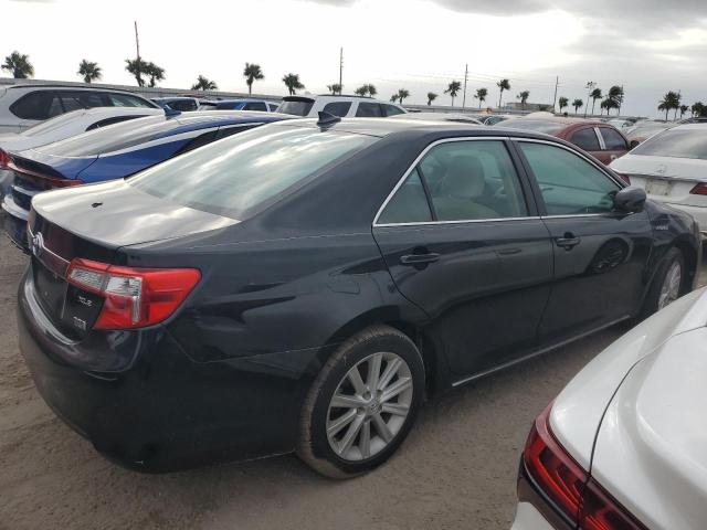 Photo 3 from auction – 2012 TOYOTA CAMRY HYBR with VIN 4T1BD1FK4CU052154