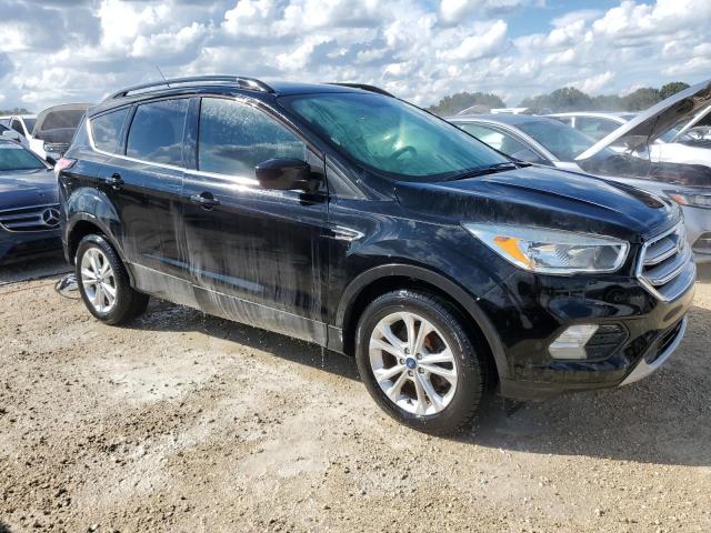 Photo 4 from auction – 2018 FORD ESCAPE SE with VIN 1FMCU0GD8JUC55298