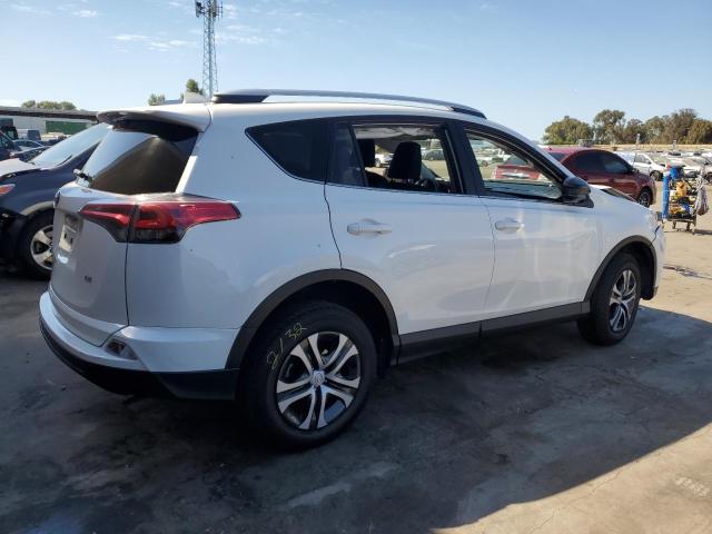 Photo 3 from auction – 2016 TOYOTA RAV4 LE with VIN JTMZFREV5GD091266