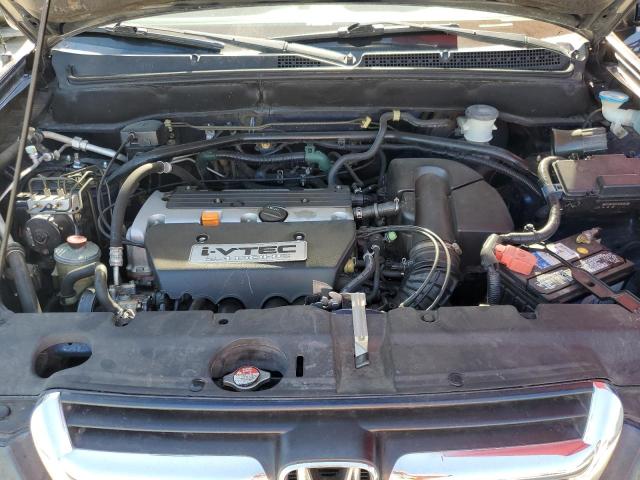 Photo 12 from auction – 2004 HONDA CR-V EX with VIN JHLRD78854C034845