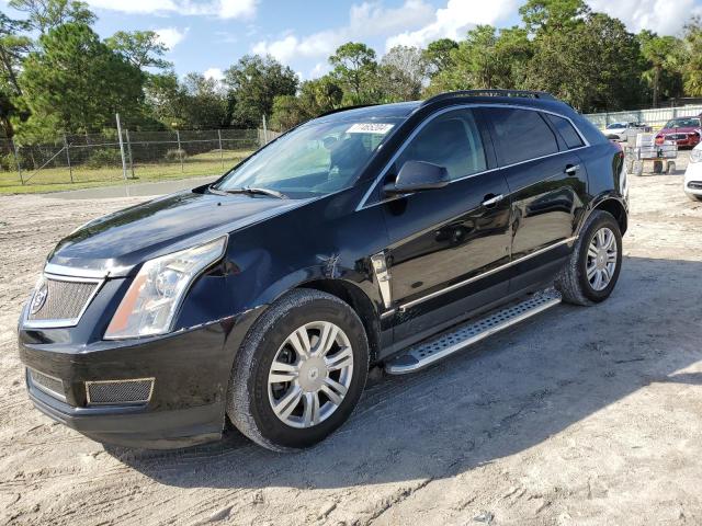 CADILLAC SRX 2011 with VIN 3GYFNGEY9BS588280 - Photo from auction