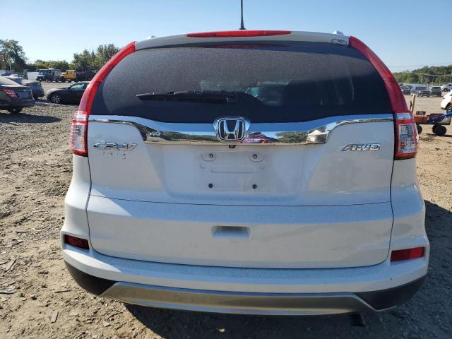 Photo 6 from auction – 2015 HONDA CR-V EXL with VIN 5J6RM4H79FL019023