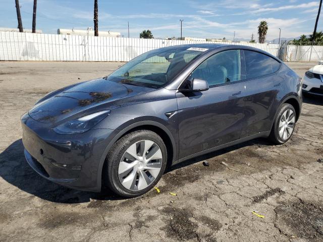 TESLA MODEL Y 2024 with VIN 7SAYGDED5RF058902 - Photo from auction