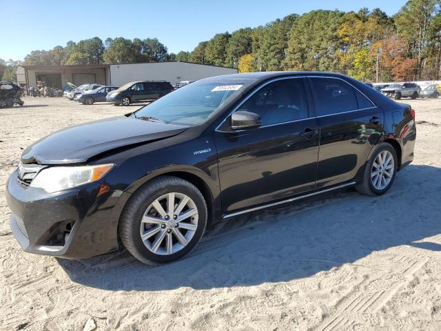 TOYOTA CAMRY HYBR 2012 with VIN 4T1BD1FK0CU032175 - Photo from auction