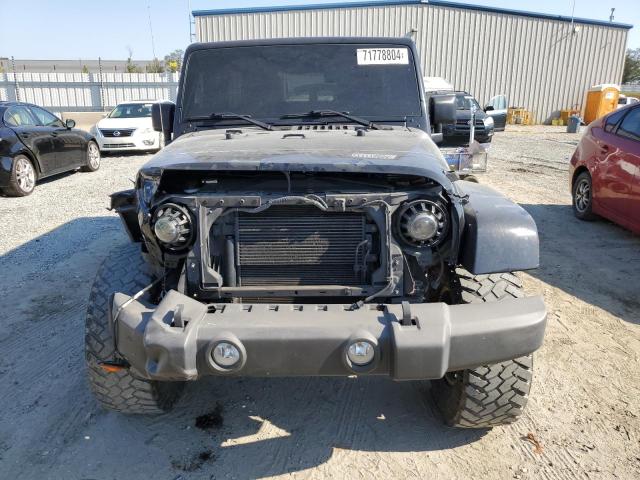 Photo 5 from auction – 2013 JEEP WRANGLER U with VIN 1C4BJWFGXDL550839