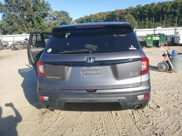 Photo 6 from auction – 2021 HONDA PASSPORT E with VIN 5FNYF8H04MB009604