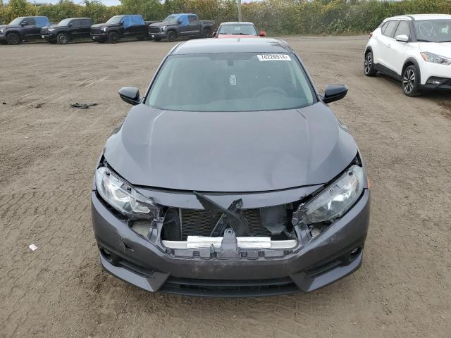 Photo 5 from auction – 2017 HONDA CIVIC DX with VIN 2HGFC2E25HH003752