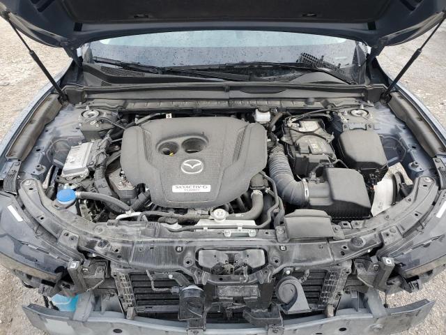 Photo 12 from auction – 2023 MAZDA CX-50 BASE with VIN 7MMVABXY2PN141854