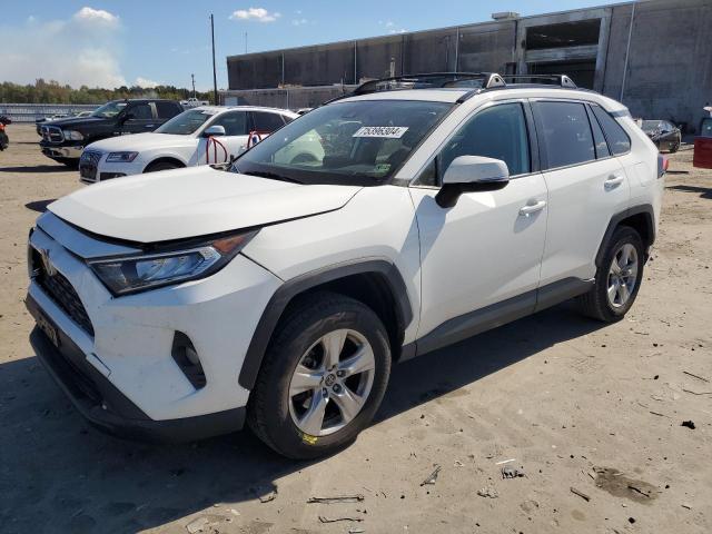 TOYOTA RAV4 XLE 2019 with VIN JTMP1RFVXKJ004430 - Photo from auction