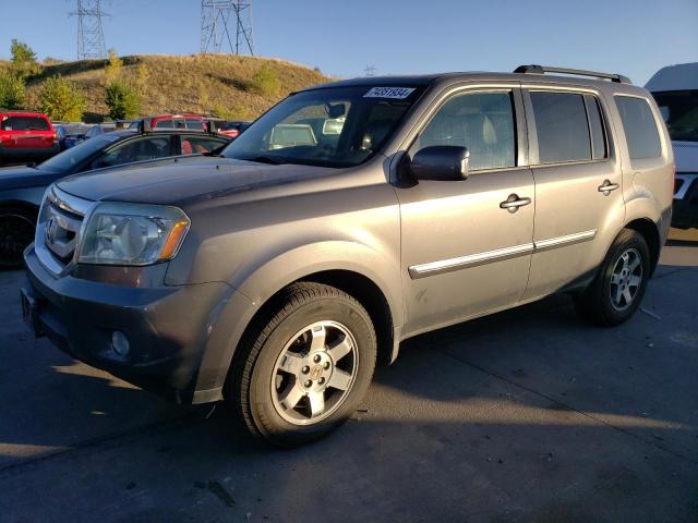 HONDA PILOT TOUR 2011 with VIN 5FNYF4H96BB033195 - Photo from auction