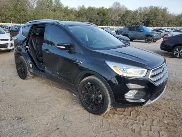 Photo 4 from auction – 2017 FORD ESCAPE TIT with VIN 1FMCU0J99HUE26008