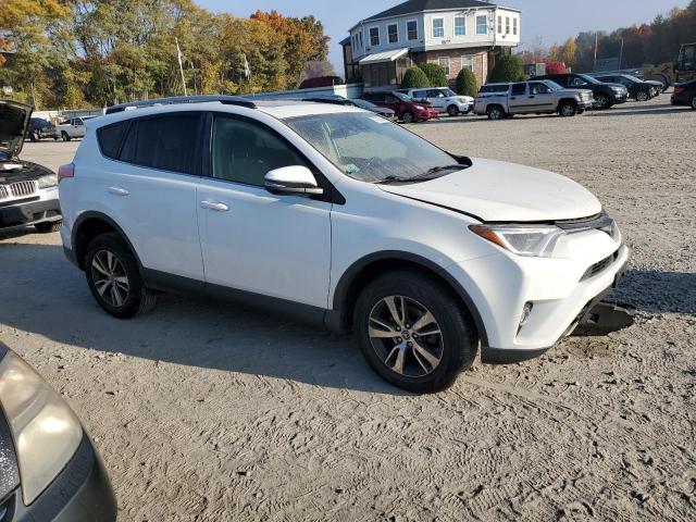 Photo 4 from auction – 2017 TOYOTA RAV4 XLE with VIN JTMRFREV9HJ714519