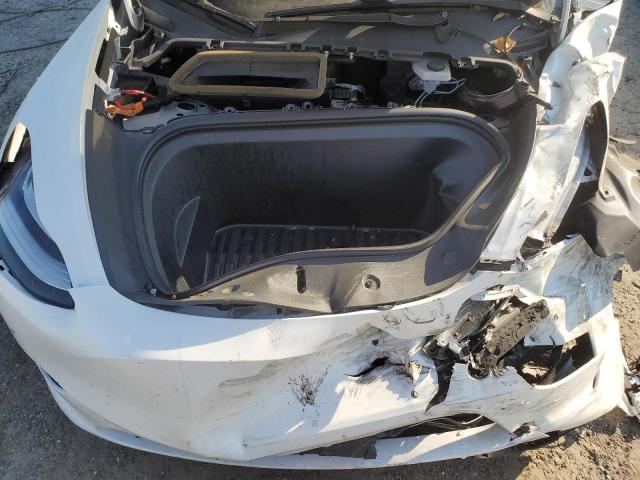 Photo 12 from auction – 2021 TESLA MODEL Y with VIN 5YJYGDEE2MF065594