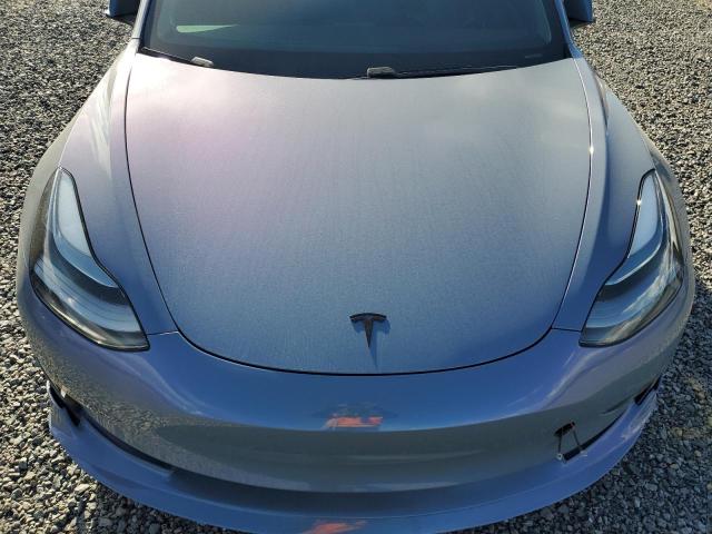 Photo 11 from auction – 2021 TESLA MODEL 3 with VIN 5YJ3E1EC8MF056511