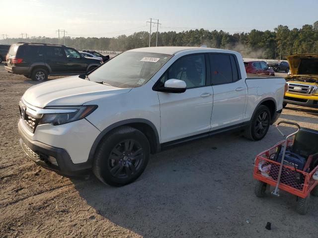 HONDA RIDGELINE 2018 with VIN 5FPYK2F18JB003117 - Photo from auction