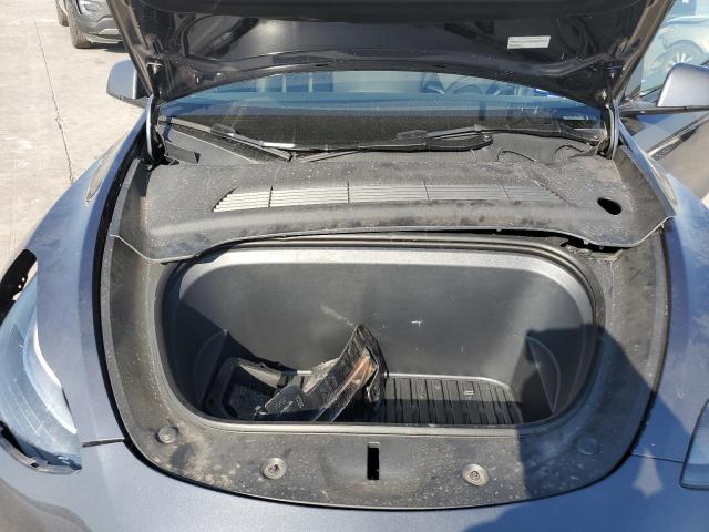 Photo 11 from auction – 2023 TESLA MODEL Y with VIN 7SAYGDED7PF957158