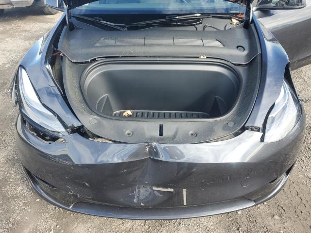 Photo 11 from auction – 2024 TESLA MODEL Y with VIN 7SAYGDEEXRA283788