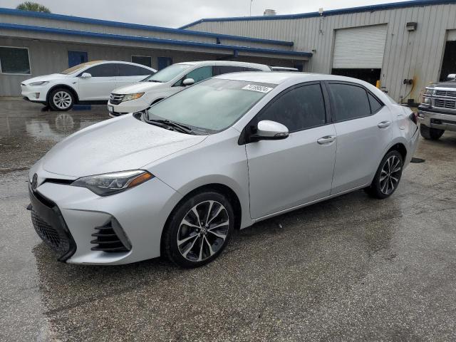 TOYOTA COROLLA L 2017 with VIN 5YFBURHE1HP641936 - Photo from auction