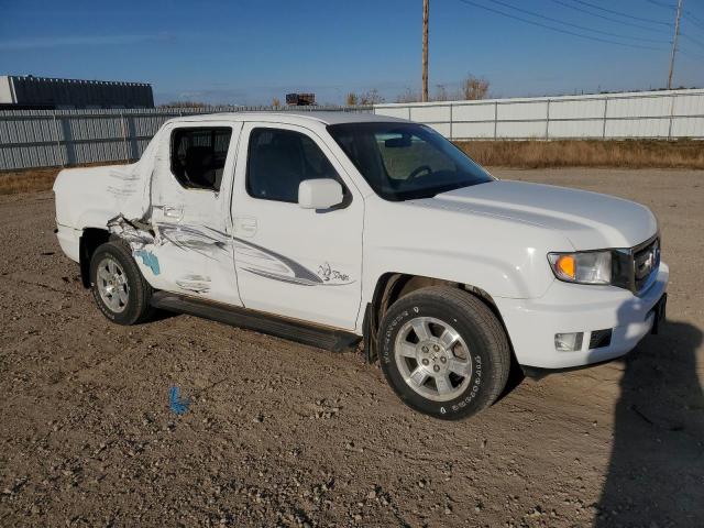Photo 4 from auction – 2010 HONDA RIDGELINE with VIN 5FPYK1F47AB010922
