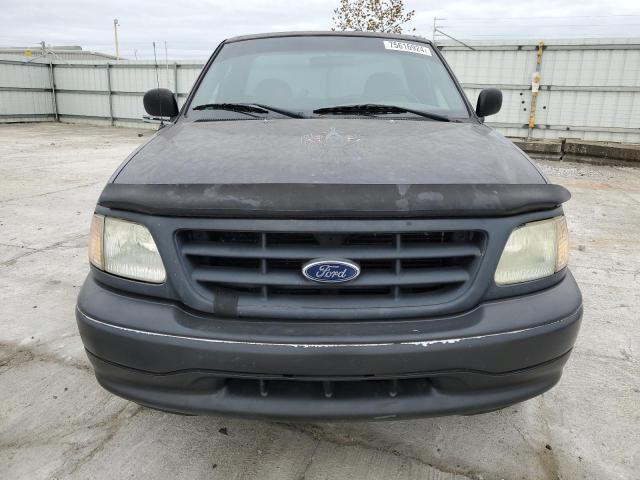Photo 5 from auction – 2003 FORD F150 4WD with VIN 1FTRF18253NB56334