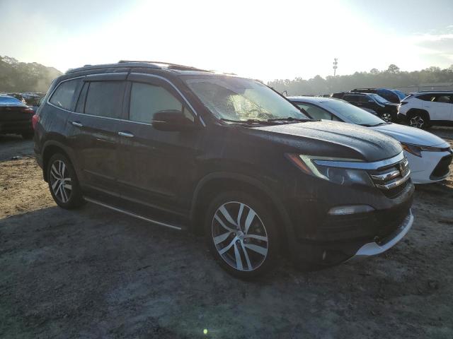Photo 4 from auction – 2018 HONDA PILOT ELIT with VIN 5FNYF6H08JB047109