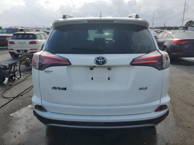 Photo 6 from auction – 2017 TOYOTA RAV4 XLE with VIN JTMWFREV1HJ713464