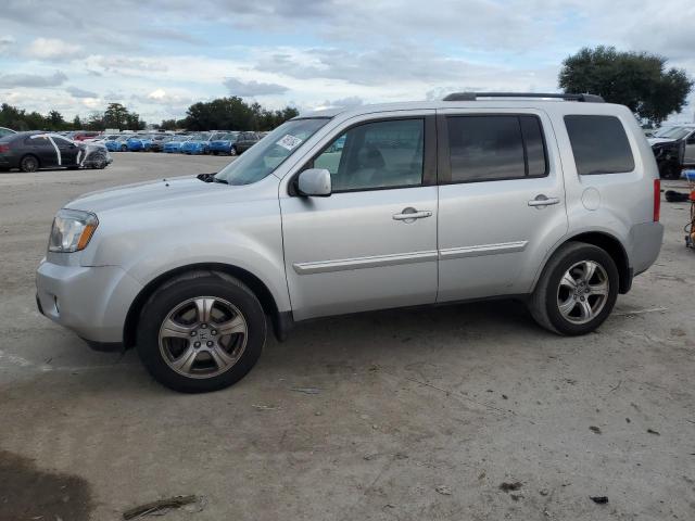 HONDA PILOT EXLN 2011 with VIN 5FNYF4H72BB092033 - Photo from auction