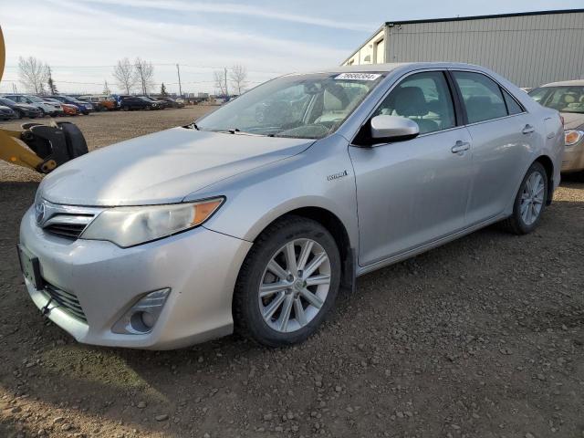 TOYOTA CAMRY HYBR 2012 with VIN 4T1BD1FK9CU021496 - Photo from auction