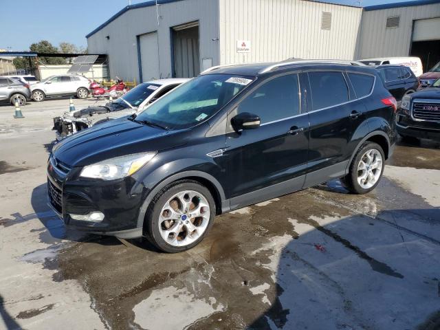 FORD ESCAPE TIT 2016 with VIN 1FMCU0J9XGUA66097 - Photo from auction