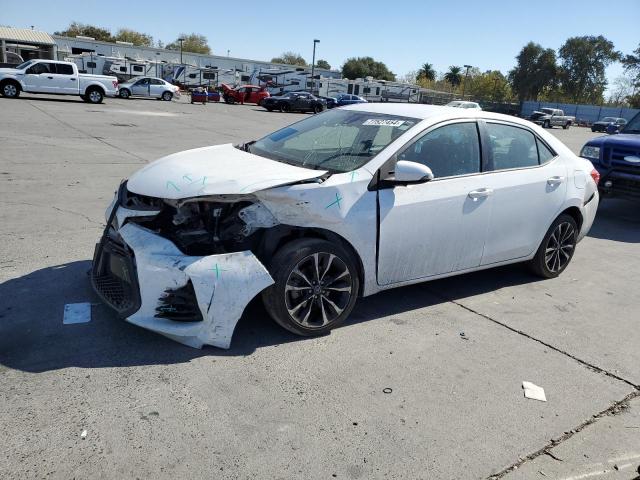 TOYOTA COROLLA L 2017 with VIN 5YFBURHE2HP661497 - Photo from auction