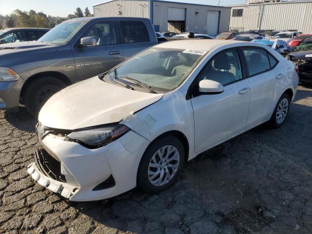 TOYOTA COROLLA L 2019 with VIN 5YFBURHEXKP922074 - Photo from auction