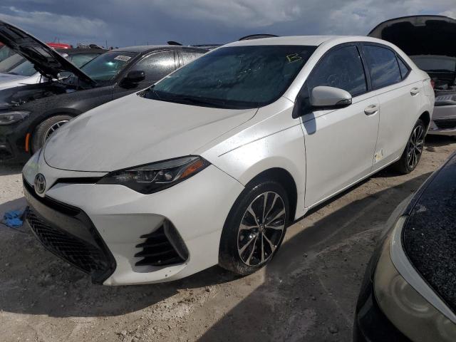 TOYOTA COROLLA L 2017 with VIN 5YFBURHE9HP663571 - Photo from auction