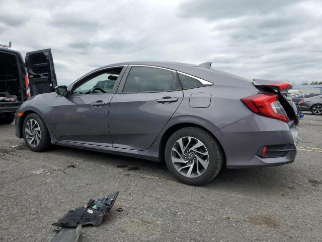 Photo 2 from auction – 2017 HONDA CIVIC EX with VIN 2HGFC2F71HH512554