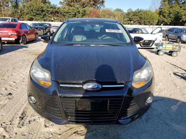 Photo 5 from auction – 2013 FORD FOCUS TITA with VIN 1FADP3N25DL198352