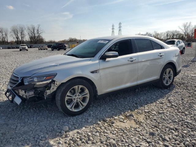 FORD TAURUS SEL 2015 with VIN 1FAHP2E8XFG131869 - Photo from auction