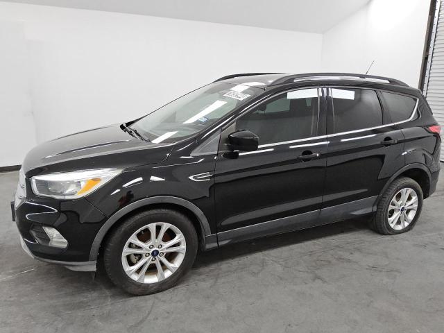 FORD ESCAPE SE 2018 with VIN 1FMCU0GD8JUC49825 - Photo from auction