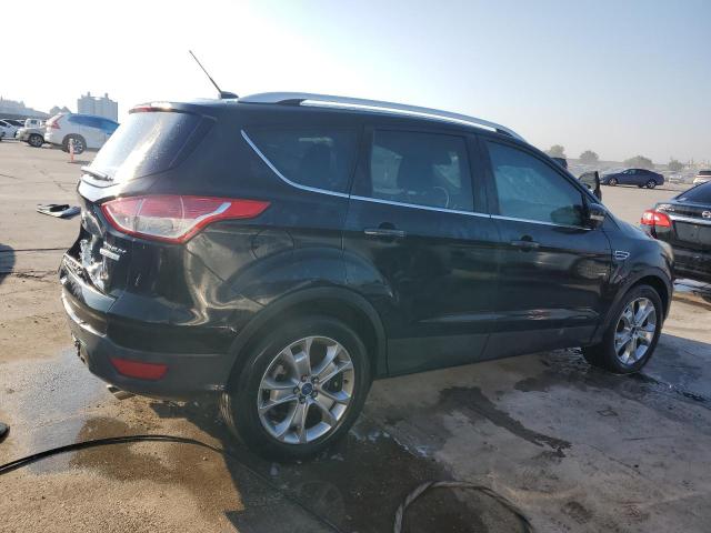 Photo 3 from auction – 2014 FORD ESCAPE TIT with VIN 1FMCU0J90EUB12355