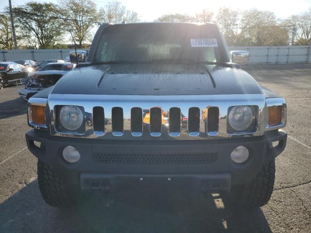 Photo 5 from auction – 2007 HUMMER H3 with VIN 5GTDN13E778225780