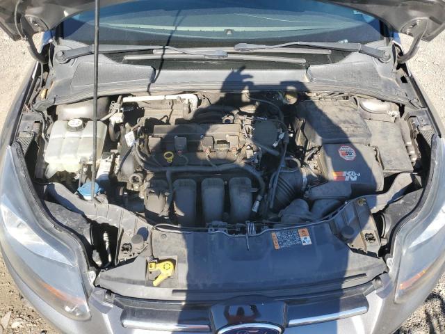 Photo 11 from auction – 2014 FORD FOCUS TITA with VIN 1FADP3J20EL357060