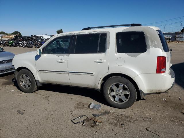 Photo 2 from auction – 2011 HONDA PILOT TOUR with VIN 5FNYF4H94BB066499