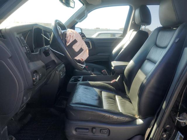 Фото 7 с аукциона – 2014 HONDA RIDGELINE с VIN 5FPYK1F52EB005562