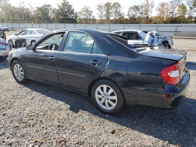 Photo 2 from auction – 2002 TOYOTA CAMRY LE with VIN JTDBF30K520019897