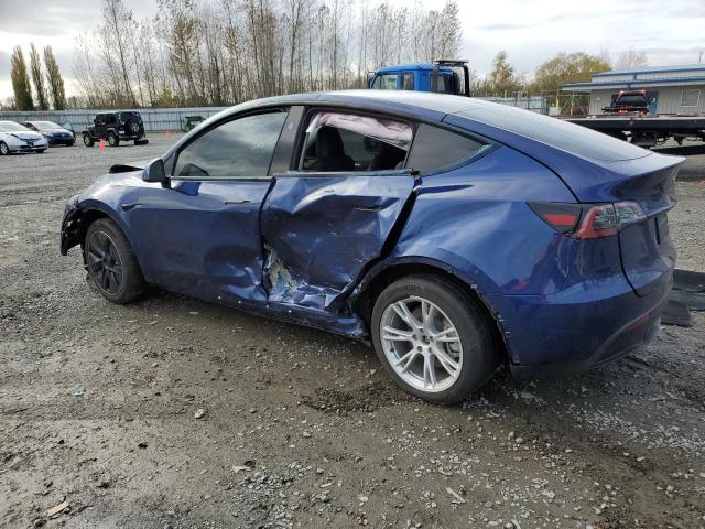 Photo 2 from auction – 2023 TESLA MODEL Y with VIN 7SAYGAEEXPF949238