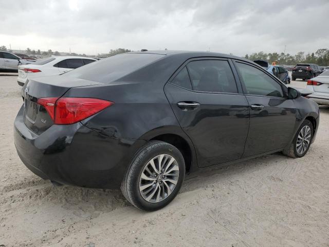 Photo 3 from auction – 2017 TOYOTA COROLLA L with VIN 5YFBURHE1HP615580