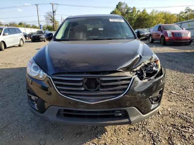 Photo 5 from auction – 2016 MAZDA CX-5 TOURI with VIN JM3KE4CY3G0866988